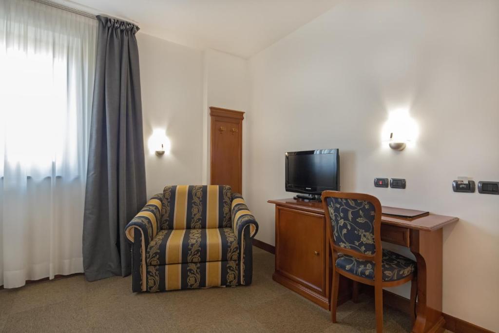 TV a/nebo společenská místnost v ubytování Hotel Medea
