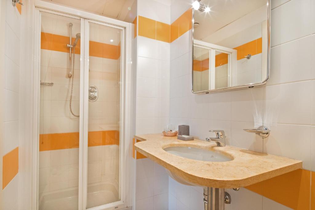 Koupelna v ubytování Hotel Medea