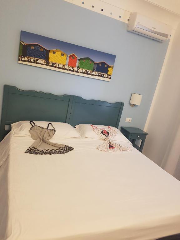 Posteľ alebo postele v izbe v ubytovaní Athena Bed & Breakfast