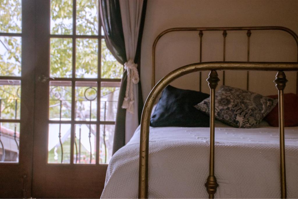 Postel nebo postele na pokoji v ubytování Hacienda La Moreda Hotel Boutique & Spa