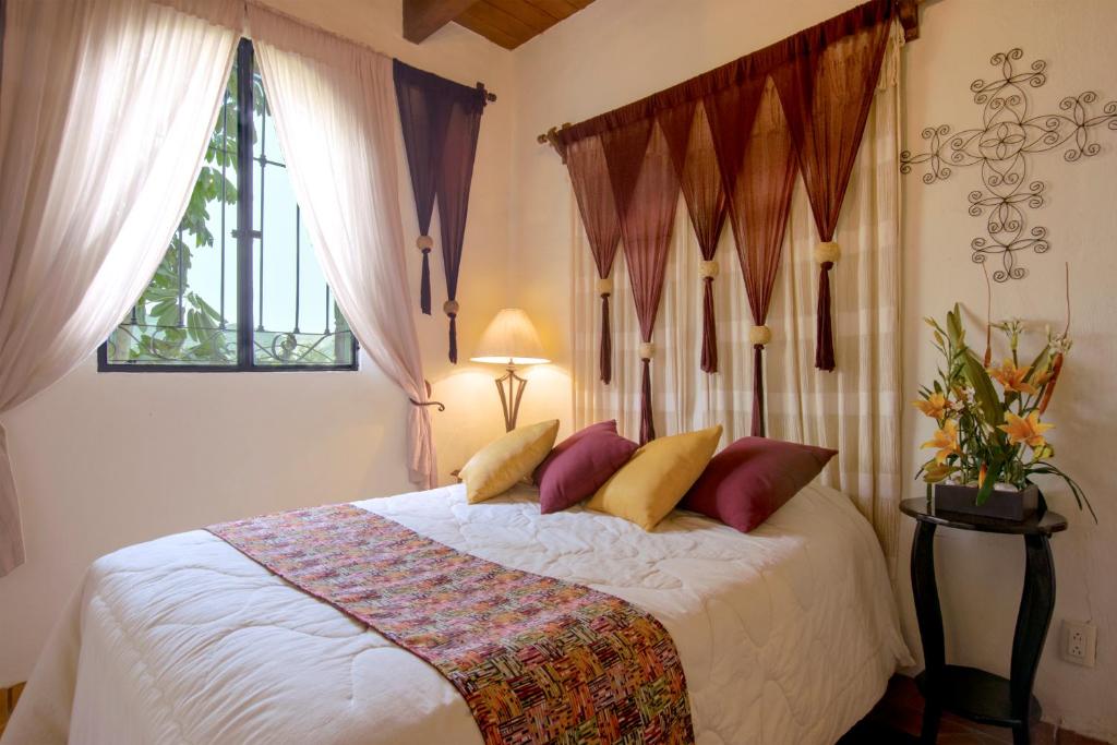 Postel nebo postele na pokoji v ubytování Hacienda La Moreda Hotel Boutique & Spa