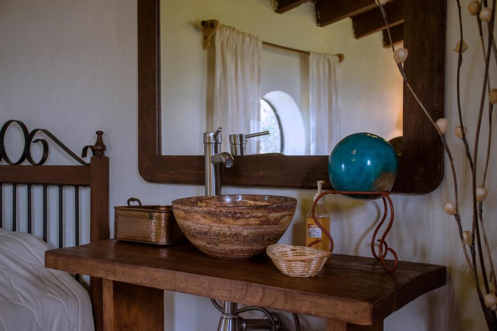 Postel nebo postele na pokoji v ubytování Hacienda La Moreda Hotel Boutique & Spa
