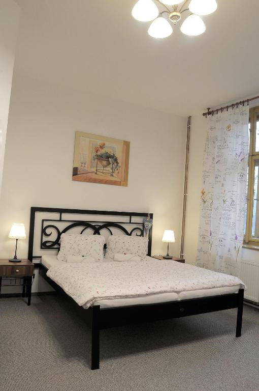 Łóżko lub łóżka w pokoju w obiekcie Apartmány V Podzámčí II.