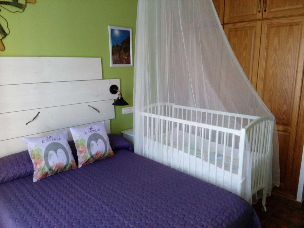 Postel nebo postele na pokoji v ubytování VIVIENDA VACACIONAL Casa Tajinaste