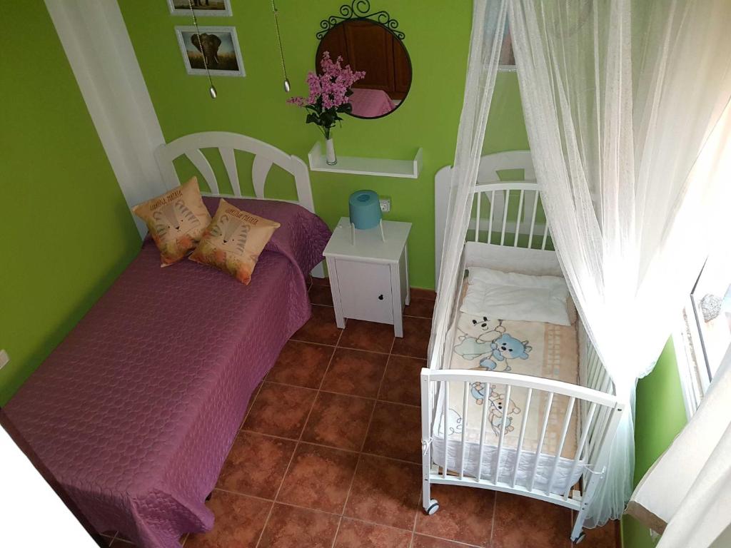 Postel nebo postele na pokoji v ubytování VIVIENDA VACACIONAL Casa Tajinaste