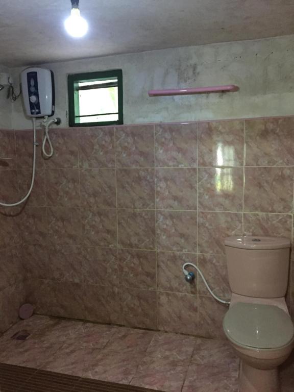 Koupelna v ubytování Bandula Home Stay