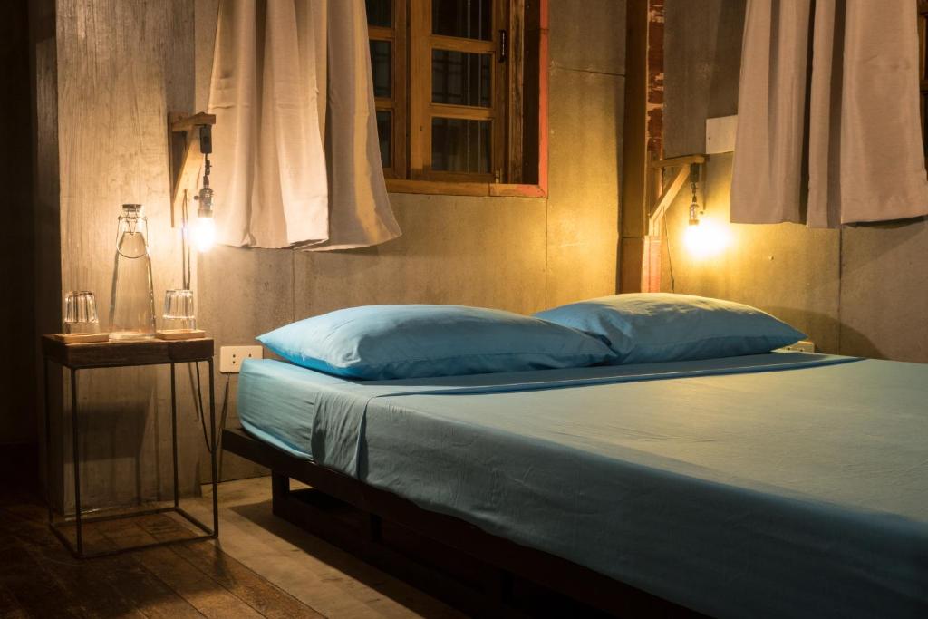 Postel nebo postele na pokoji v ubytování The Flying Fish Hostel