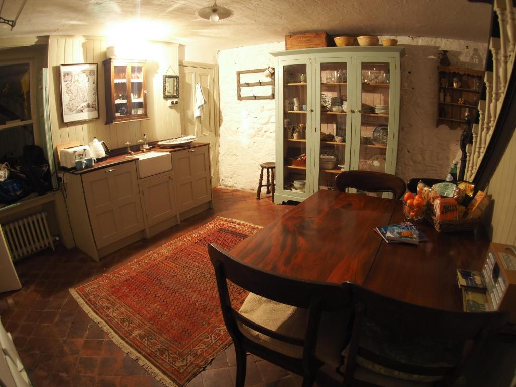 Kuchyň nebo kuchyňský kout v ubytování No.33 Coach House