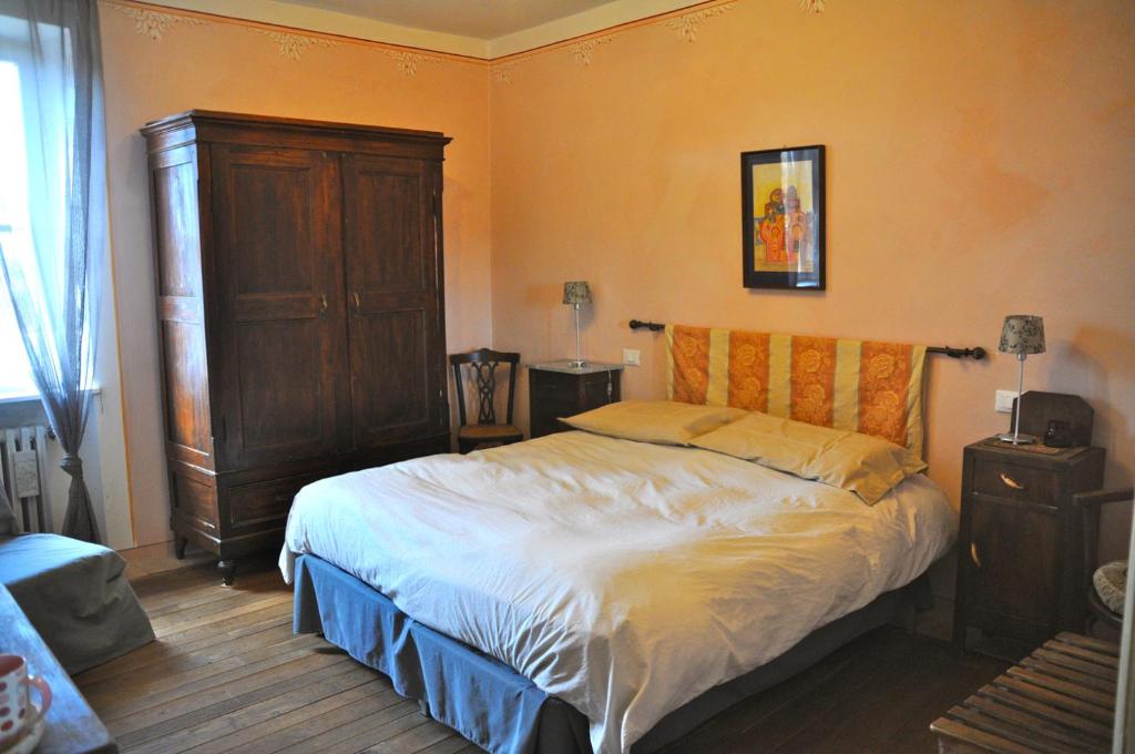 Postel nebo postele na pokoji v ubytování B&B Il Molinello