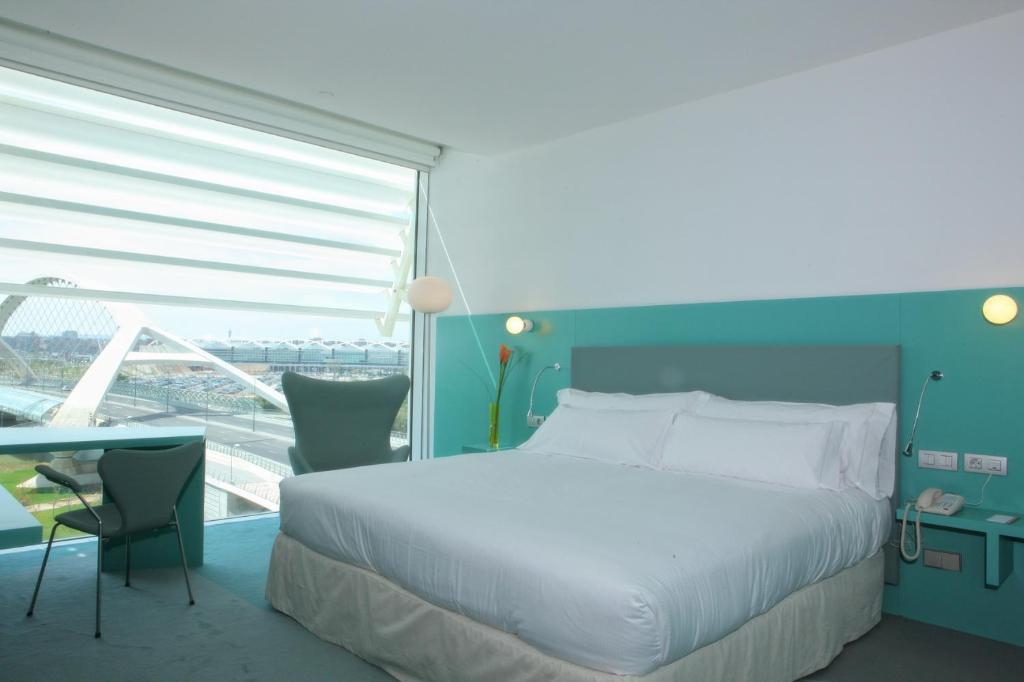 Postel nebo postele na pokoji v ubytování Hotel Hiberus