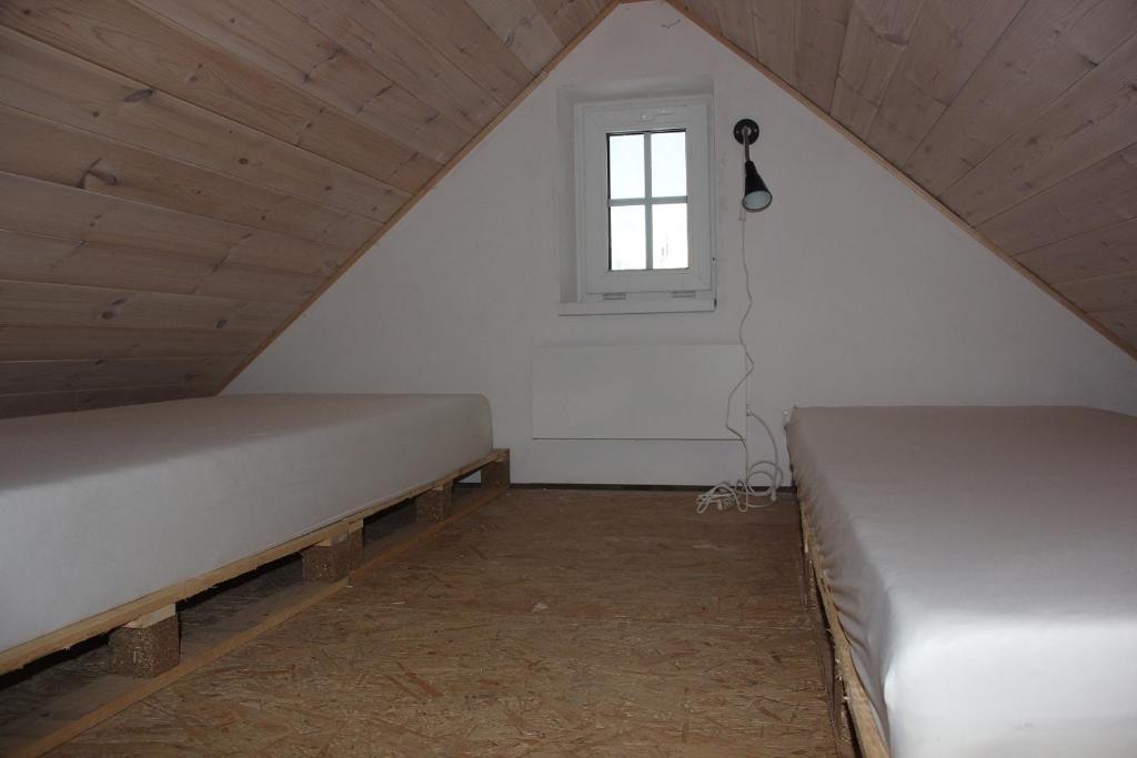 Postel nebo postele na pokoji v ubytování Chata Fajfrtka