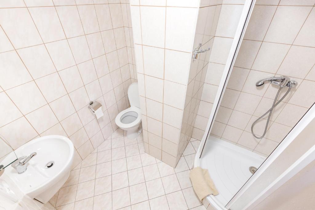 Koupelna v ubytování Hotel Gradl