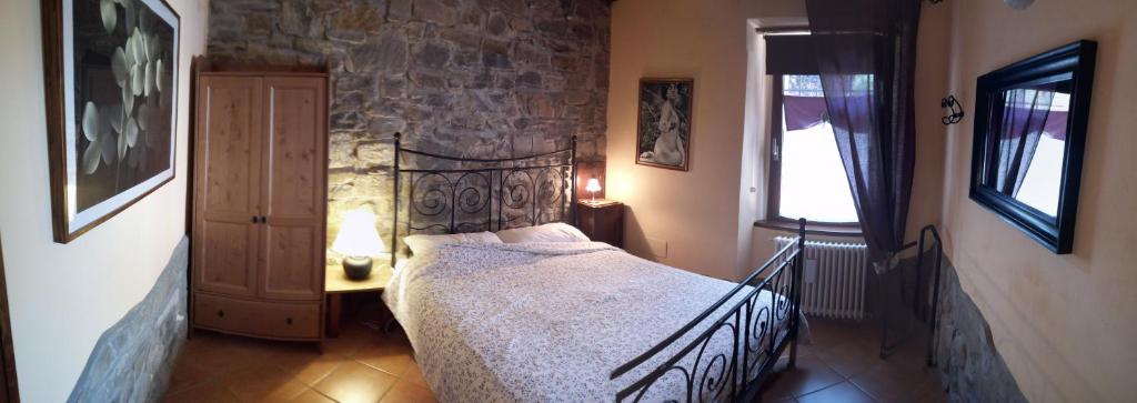 เตียงในห้องที่ CA CIARI Casa vacanze