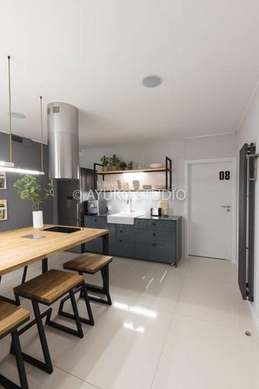 Kuchyň nebo kuchyňský kout v ubytování Sport Rooms II Chodakowska Warszawa