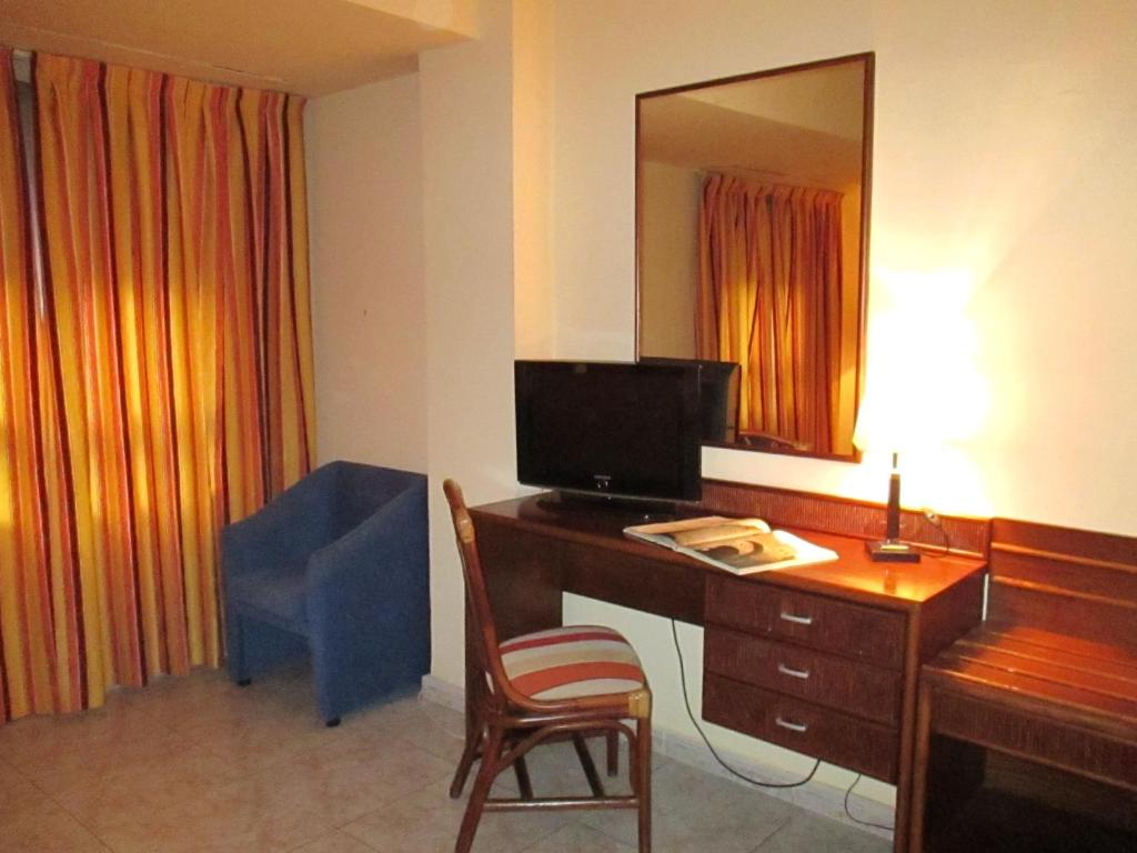 TV a/nebo společenská místnost v ubytování Hotel Perales