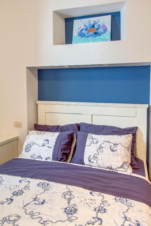 Postel nebo postele na pokoji v ubytování Hotel Sansegus