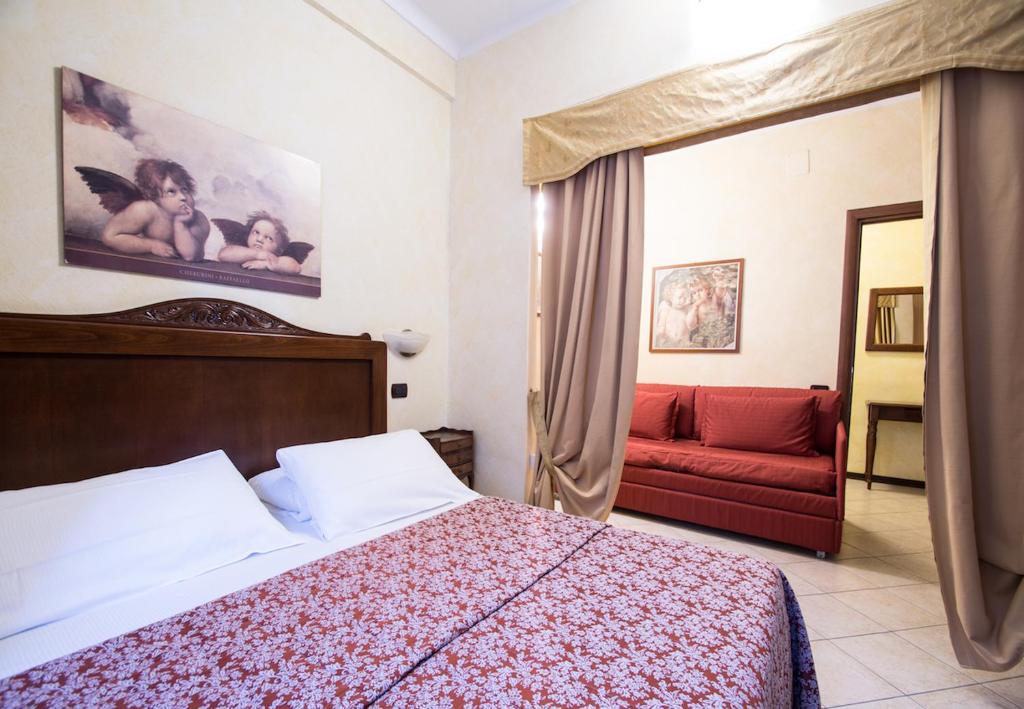 Postel nebo postele na pokoji v ubytování Limone Palace Aparthotel