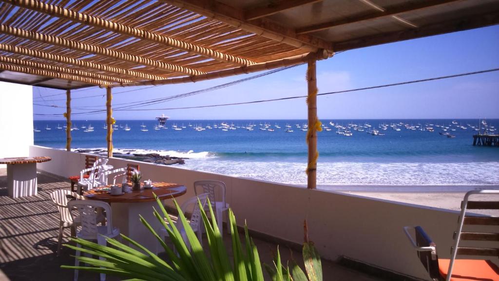 a patio with a view of the ocean at El Merlin - Cabo Blanco in Cabo Blanco