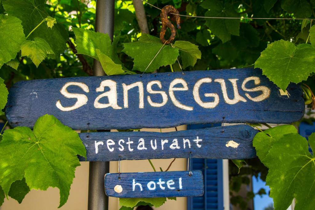 a blue sign that reads samlezlezlezfficient retentionarf at Hotel Sansegus in Susak