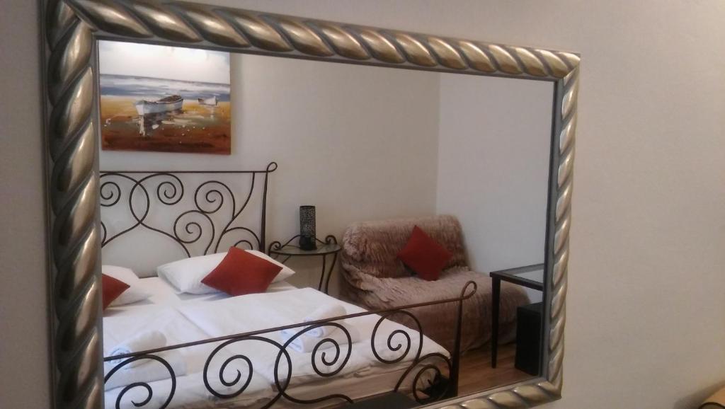 Postel nebo postele na pokoji v ubytování Old Town Suites