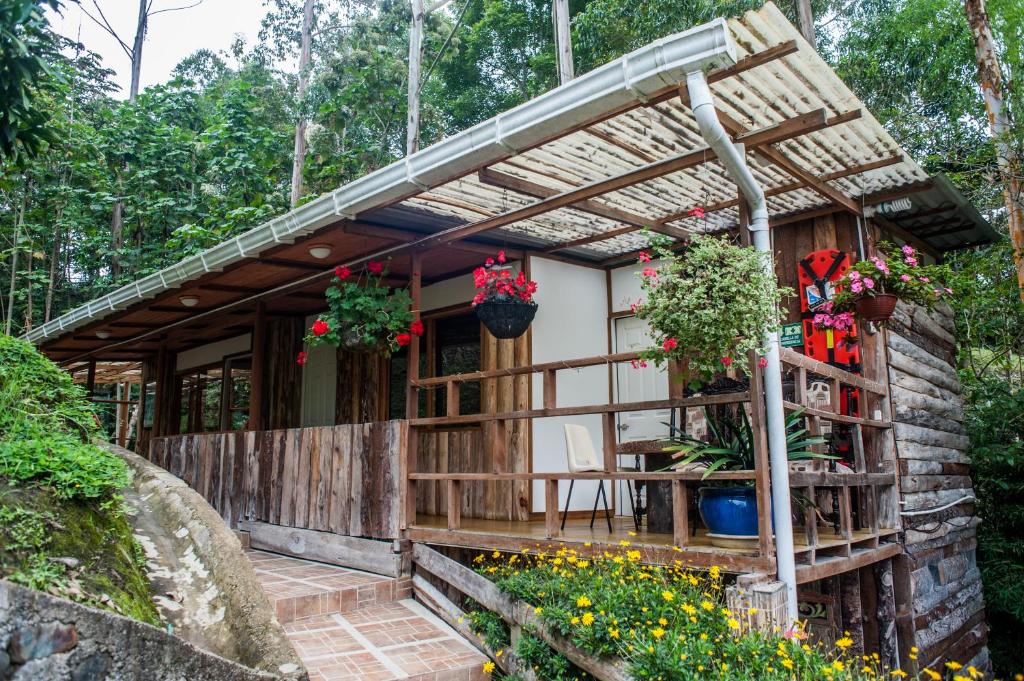 a small house with a pergola at Hotel Selva Verde in Salento