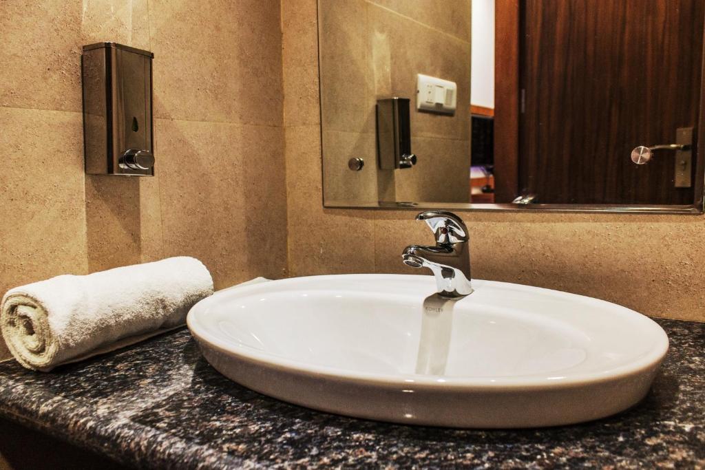 Koupelna v ubytování Hotel Suktara International