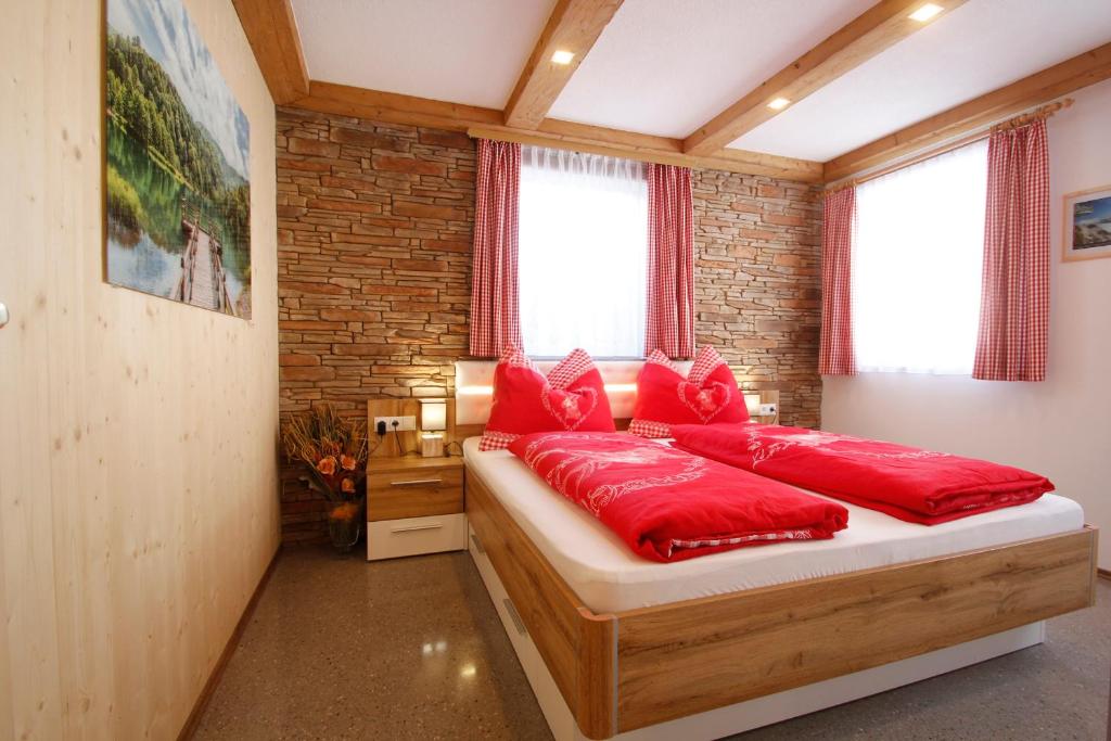 Postel nebo postele na pokoji v ubytování Appartement Almzeit mit Infrarotkabine