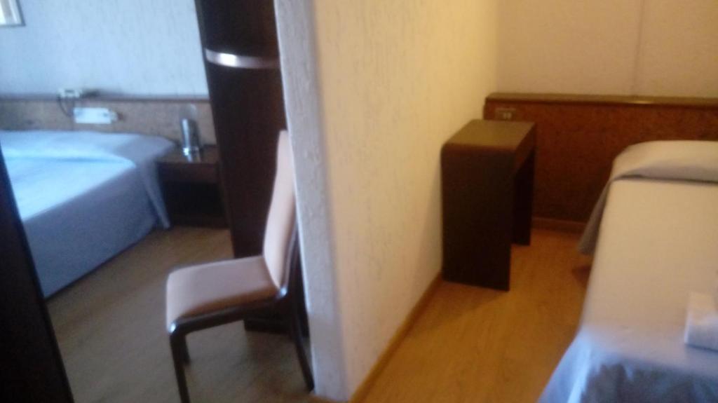 Łóżko lub łóżka w pokoju w obiekcie Hotel Franini