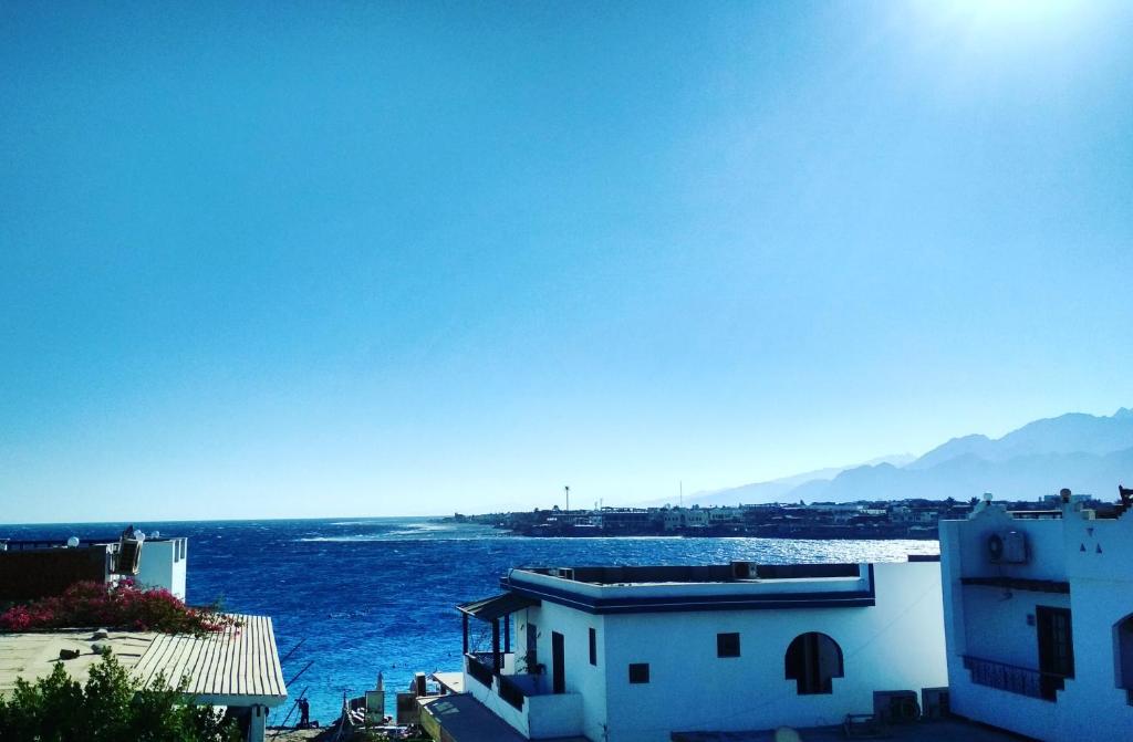 a view of the ocean from a building at Golden Europe Hotel in Dahab