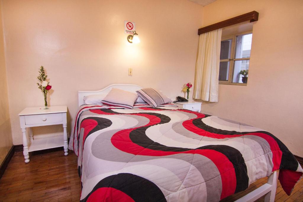 Postel nebo postele na pokoji v ubytování Hotel Europa