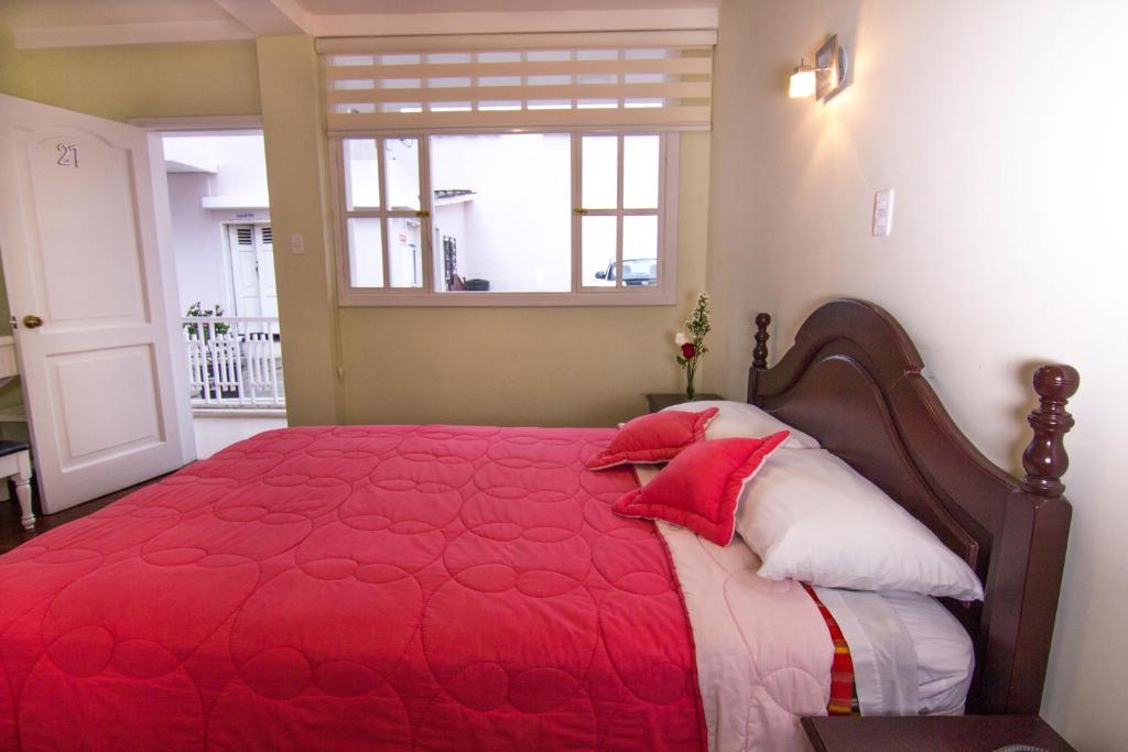 Postel nebo postele na pokoji v ubytování Hotel Europa