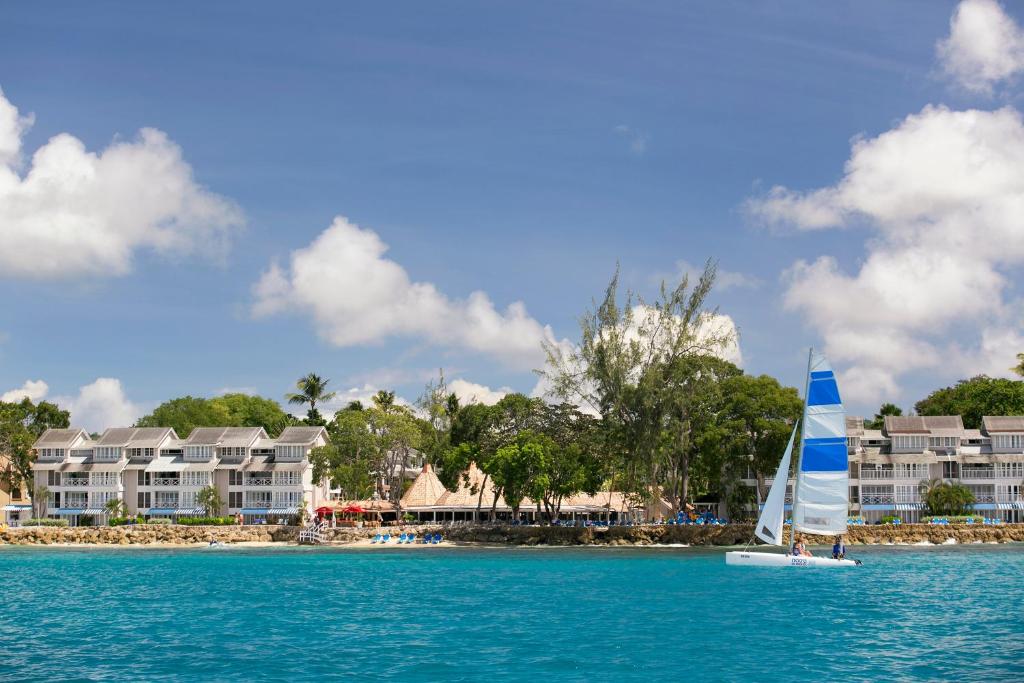 sachin and babi light blue dress Barbados Travel Tips