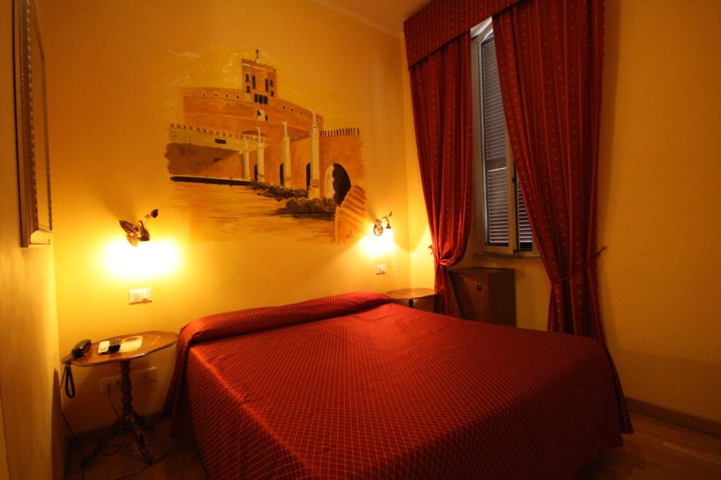 Postel nebo postele na pokoji v ubytování Hotel Termini