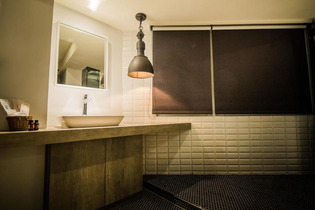 Koupelna v ubytování Huwei Hotel