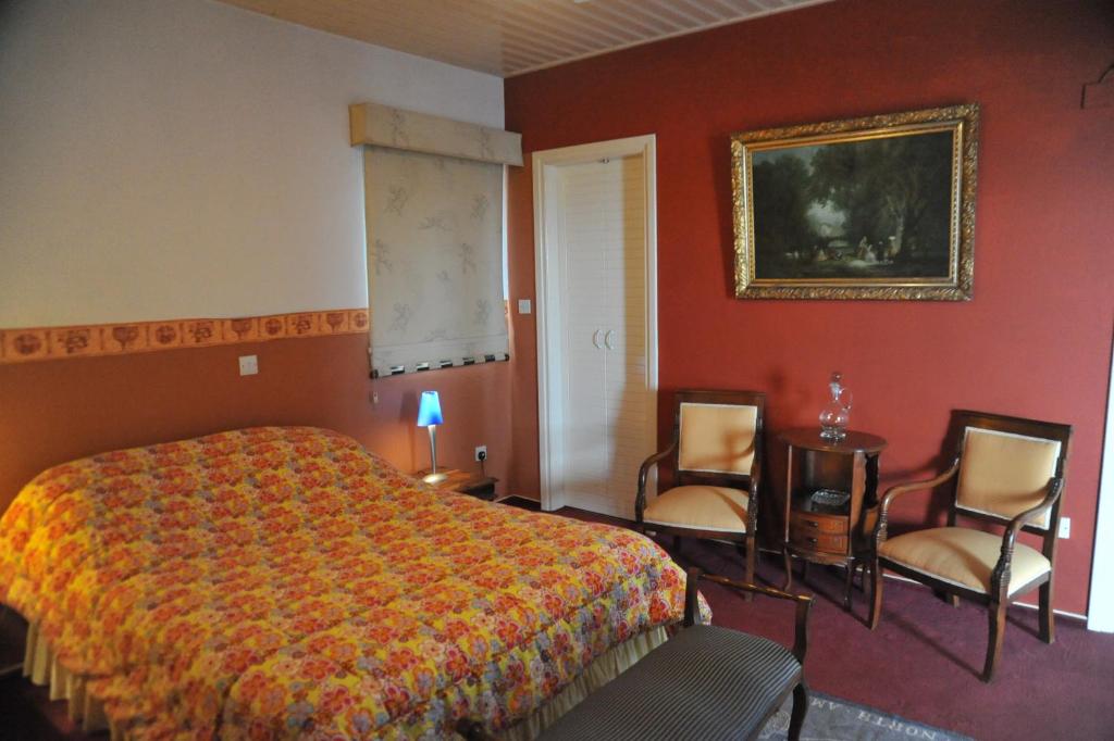Postel nebo postele na pokoji v ubytování Residence L' Aubrais