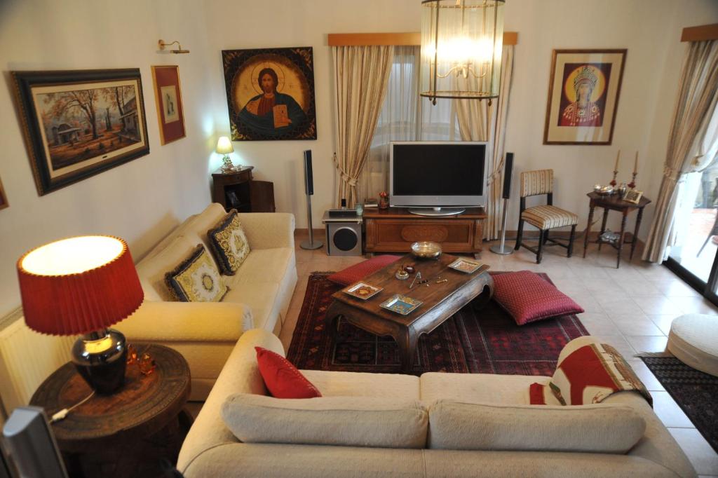 TV a/nebo společenská místnost v ubytování Residence L' Aubrais