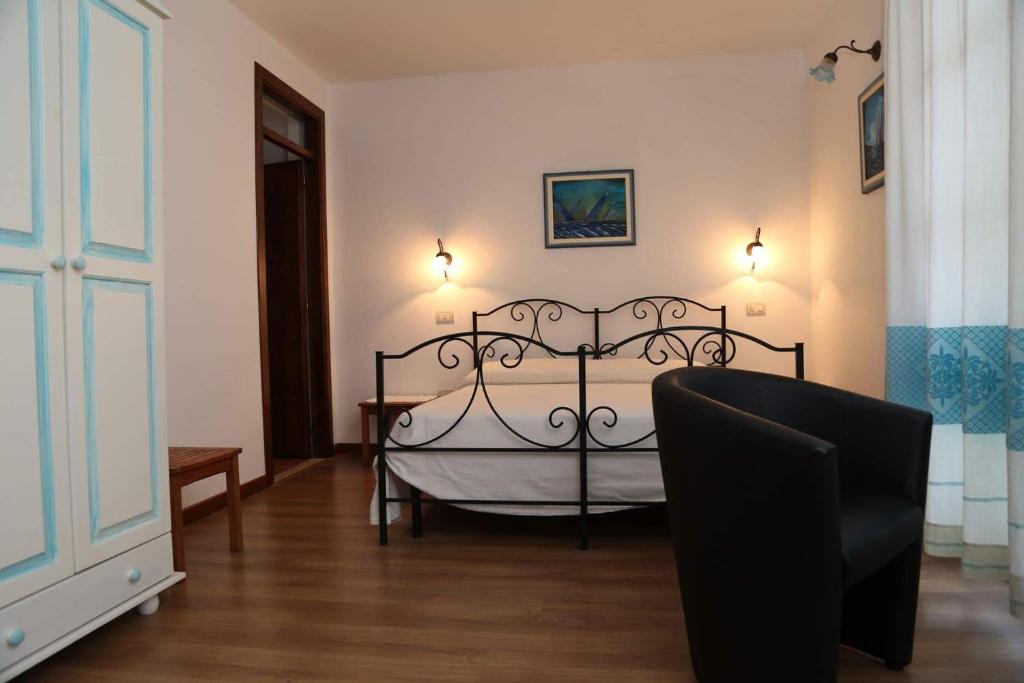 Postel nebo postele na pokoji v ubytování B&B Tre - Rooms & Relax