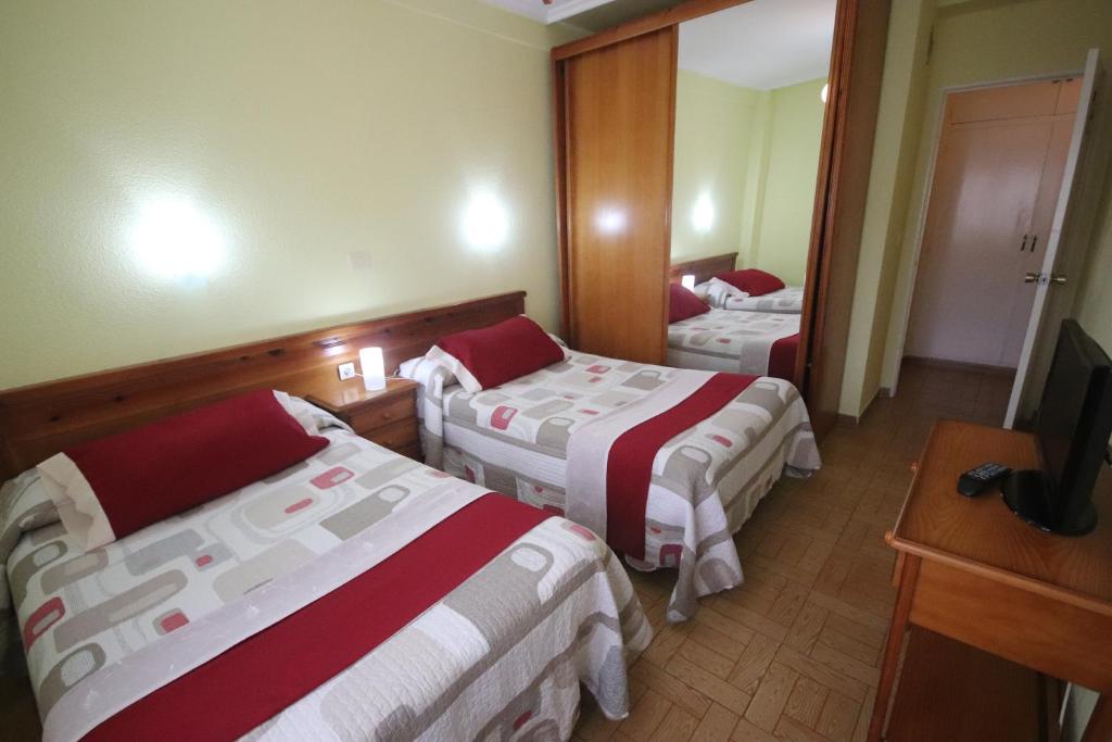 Postel nebo postele na pokoji v ubytování Tita sanpatiel