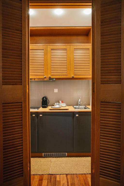 A kitchen or kitchenette at Mitropolitou Iosif Sea View Flat