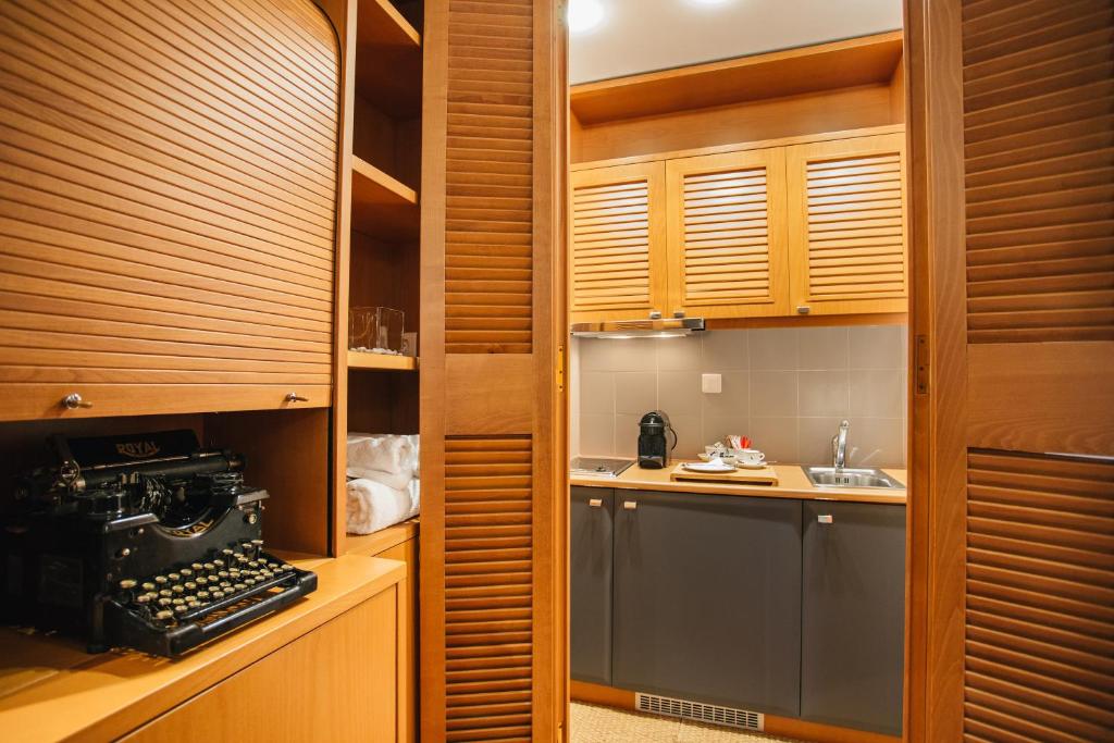 A kitchen or kitchenette at Mitropolitou Iosif Sea View Flat