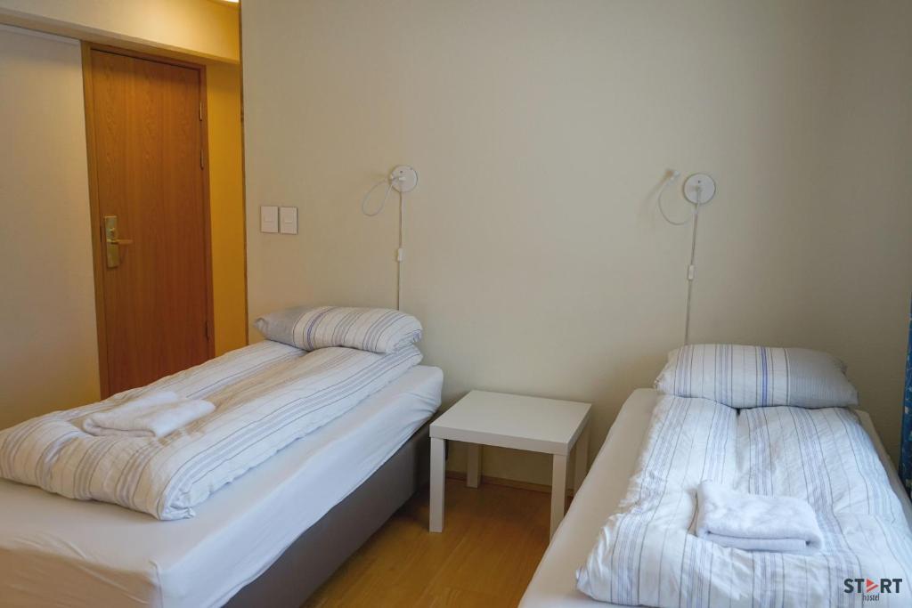 Uma cama ou camas num quarto em Start Keflavík Airport