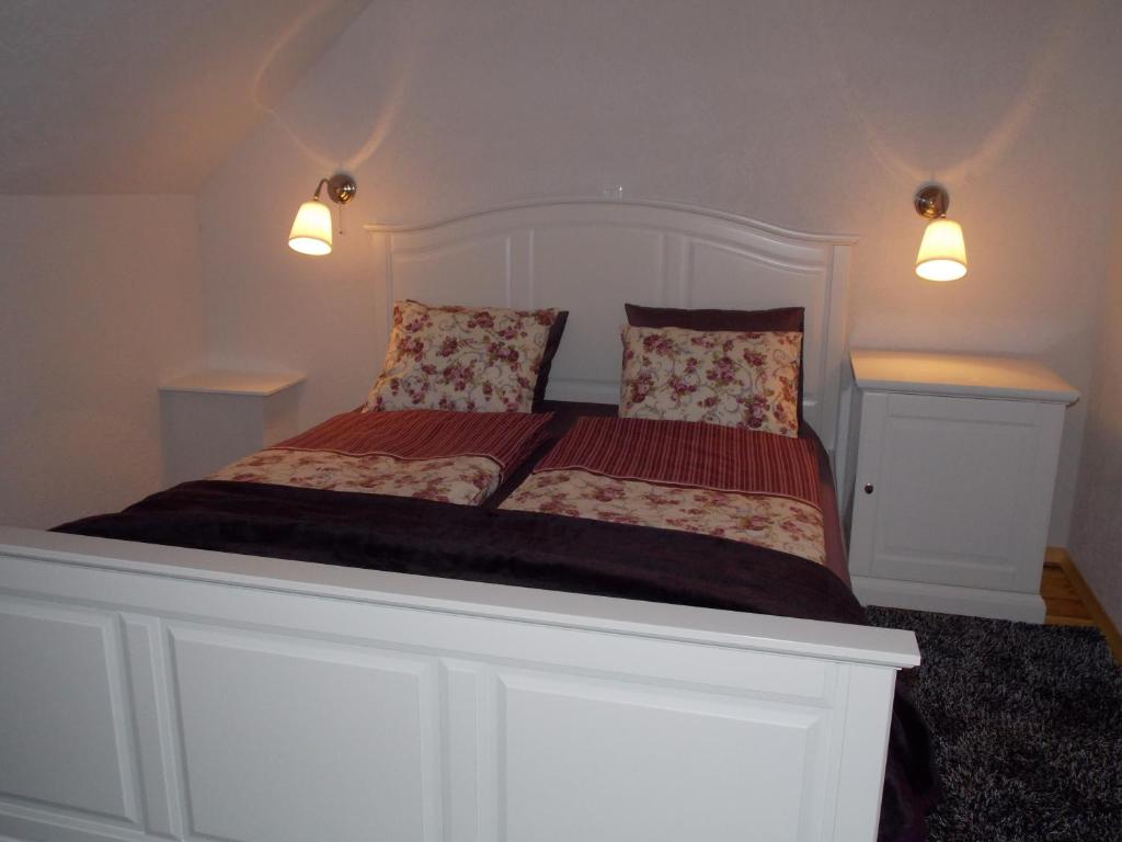 Postel nebo postele na pokoji v ubytování Guesthouse Stari Tišler