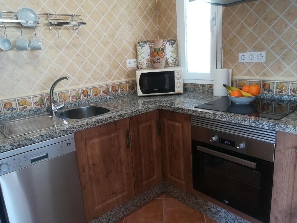 Kuchyň nebo kuchyňský kout v ubytování Casa Ayo