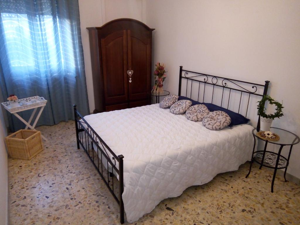 Postel nebo postele na pokoji v ubytování B&B Lilium Otranto