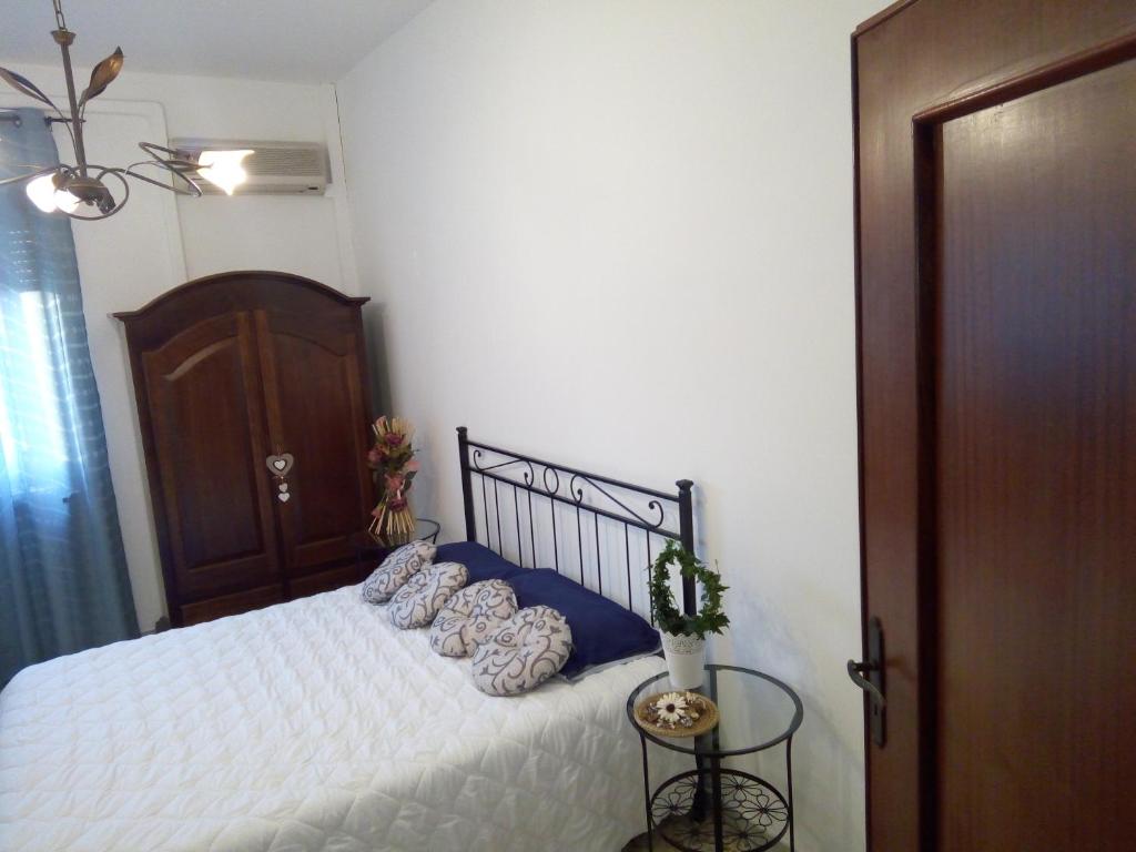Postel nebo postele na pokoji v ubytování B&B Lilium Otranto