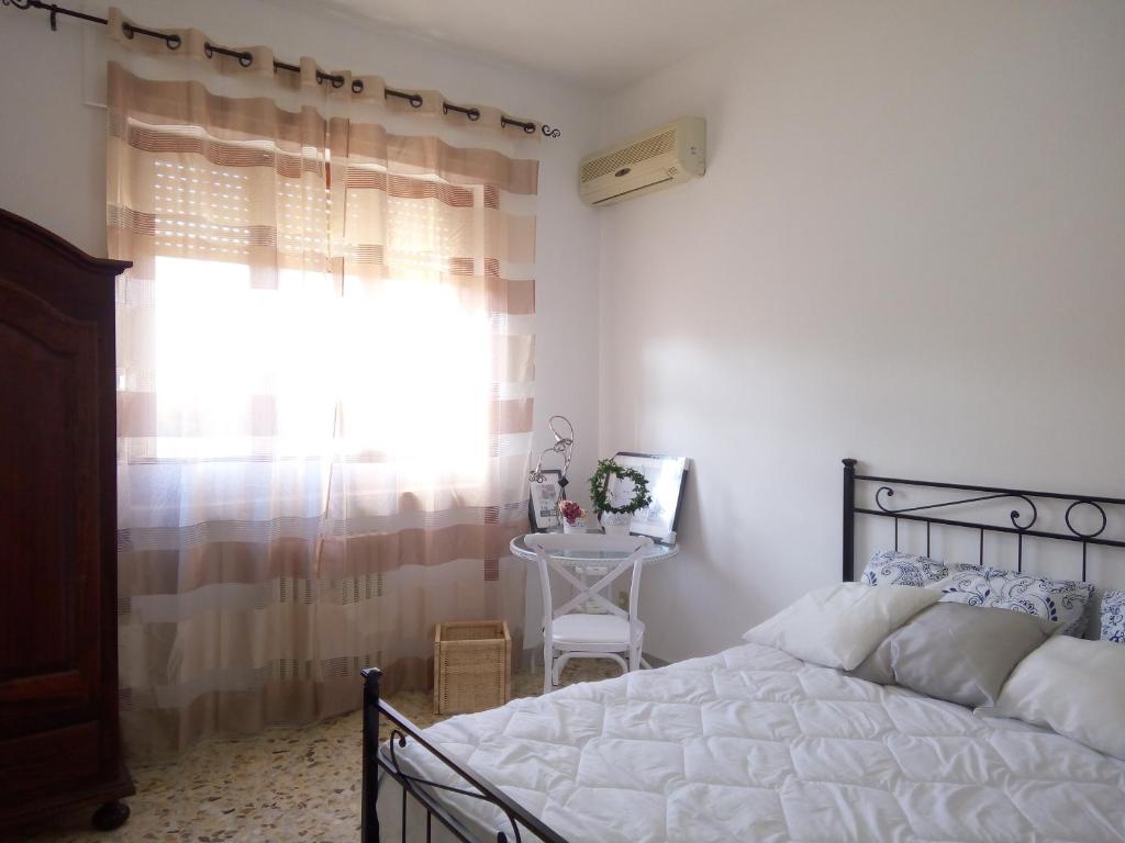 Postel nebo postele na pokoji v ubytování B&B Lilium Otranto