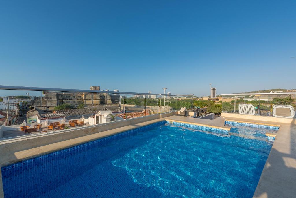 Bazén v ubytování Getsemani Cartagena Hotel nebo v jeho okolí