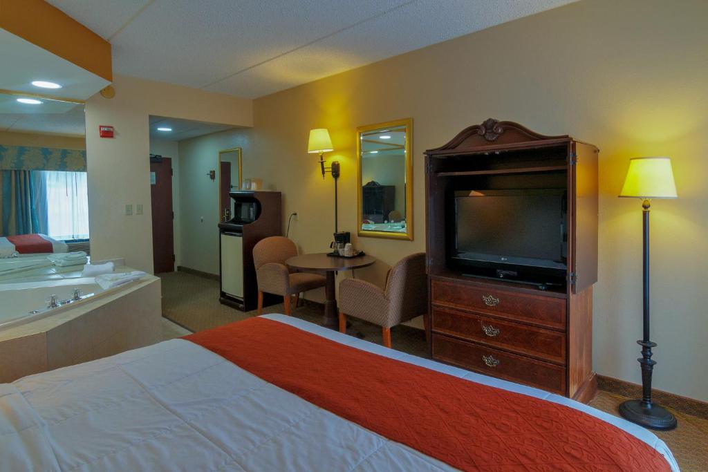 Postel nebo postele na pokoji v ubytování Hotel M Mount Pocono