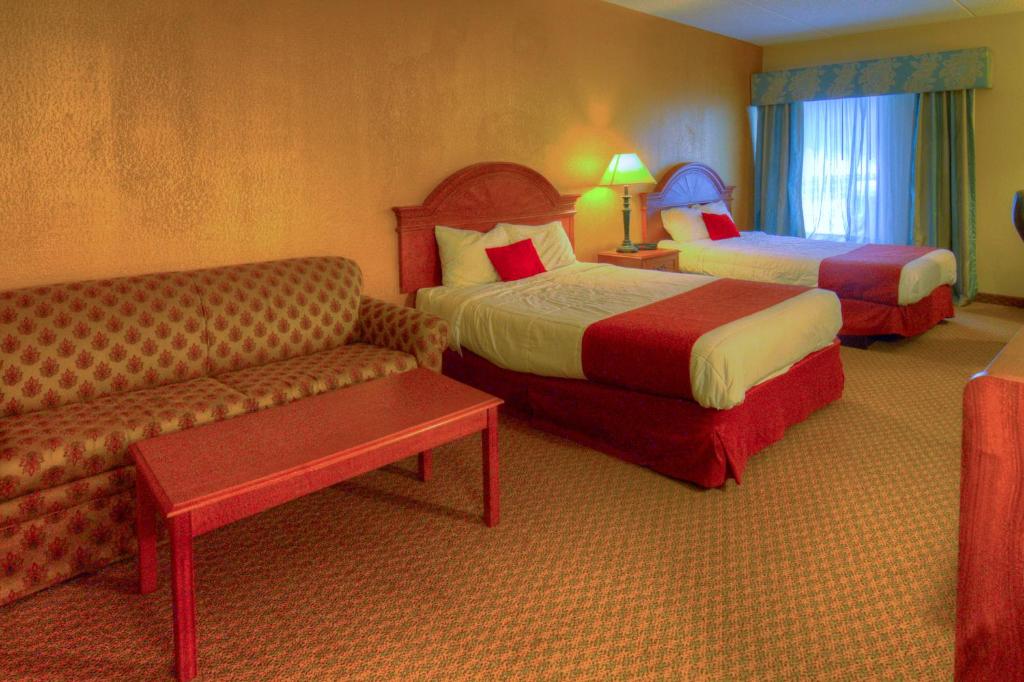 Postel nebo postele na pokoji v ubytování Hotel M Mount Pocono
