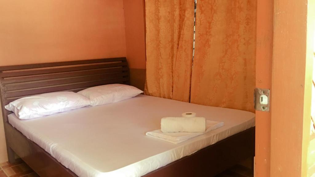 Postel nebo postele na pokoji v ubytování Westpoint Inn